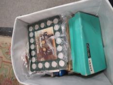 Eight small world stamp albums, two empty stamp albums, three boxes and a bag of loose stamps