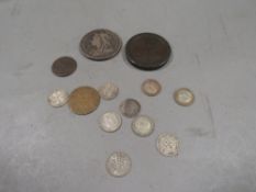 A small tub of collectable coinage to include 1895 crown