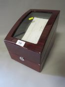An electronic twin automatic watch winder
