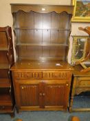 A small oak linen fold Welsh style dresser