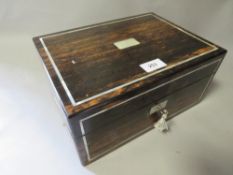 A vintage coromandel box with mother of pearl inlay