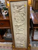 A gilt framed Greco Roman style plaque W 127 cm