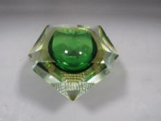 A studio glass inkwell in green