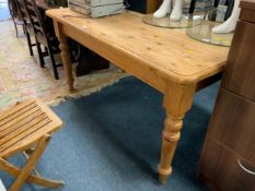 A honey pine farmhouse style table