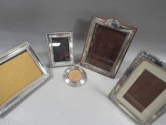 Five assorted hallmarked silver photo frames
