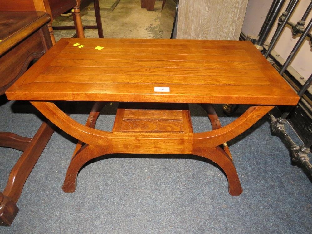 A modern hardwood X framed bench/table