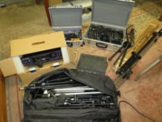 A large selection of microphone stands, microphones, mixers and a DR8000 karaoke player