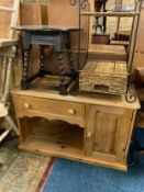 A modern pine TV cabinet together with an occasional table and a wicker cabinet