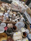 Three trays of assorted ceramics to include plates, Staffordshire style spaniels etc