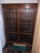 An early 20th century mahogany two door glazed bookcase