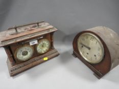 An oak mantle clock and barometer complete with original thermometer together with a mantle clock (