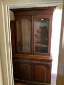 A Victorian mahogany glazed library bookcase