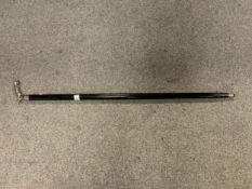 A modern ebonised walking cane with a Jaguar finial