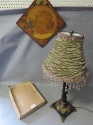 A vintage lamp together with a vintage bolero