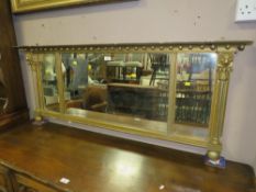 An antique gilt over mantel mirror with lion head masks W 135 cm