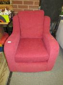 A modern red easy armchair