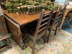 An oak refectory style dining table and four chairs