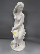A parianware style figure of a semi-nude sitting on sea rocks stamped Minton to base