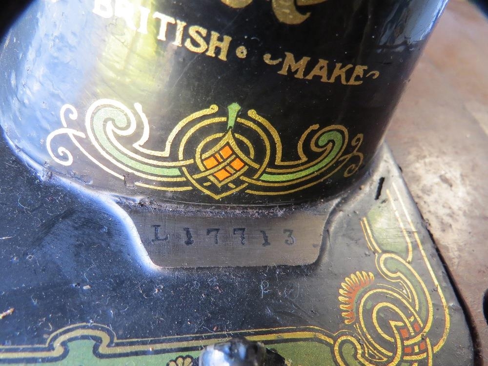 An antique Bradburys sewing machine and cast iron stand - Image 4 of 4