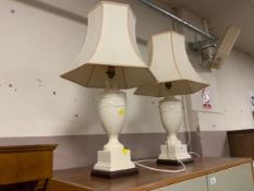 A pair of modern cream table lamps with shades