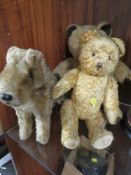 Two vintage bears together with a toy dog