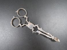 A pair of Georgian hallmarked silver sugar tongs