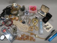 A box of collectables and jewellery