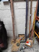 A selection of fishing rods, reels and accessories