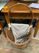 A vintage wicker basket together with a selection of calipers, measuring equipment, etc.