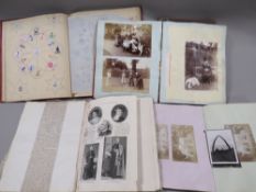 A small tray of antique photograph albums, scrap books etc