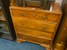 A light oak chest of four drawers A/F