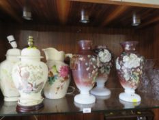 A shelf containing selection of glass vases, ceramic pitcher and two lamps A/F