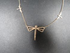 A hallmarked 9ct gold necklet in the form of a dragonfly, approx. weight 2.5 g