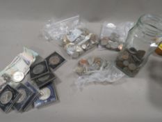 A collection of vintage bank notes and coinage