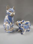 A vintage Nancy Lopez blue and white mosaic style figure of a cat - marked to base, together with