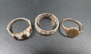 A hallmarked 9ct gold ring approx weight 1.3 g, together with an unmarked eternity ring plus a