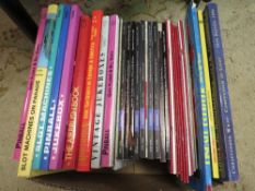 A tray of assorted auction catalogues and books related to gaming machines