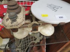 A vintage set of Avery scales and associated weights