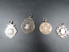 Four silver and white metal fob medals (4)