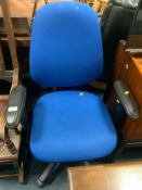 A modern blue swivel office chair