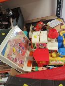 A tray of children's toys to include a vintage Fisher Price circus train