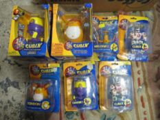 A tray of assorted packaged Cubix figures