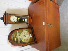 Two vintage style clocks together with a leather covered trunk