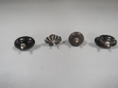 Four hallmarked silver tea and coffee pot knobs