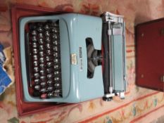 A Casio keyboard, vintage typewriter, calculator etc