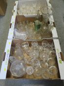 Four trays of assorted glassware to include a cut glass biscuit barrel