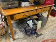 A vintage oak two drawer desk W 137 cm