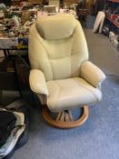 A cream, leather style reclining armchair