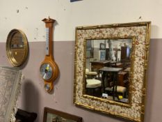 Two gilt wall mirrors together with a modern barometer