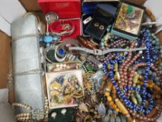 A tray of assorted costume jewellery and watches etc